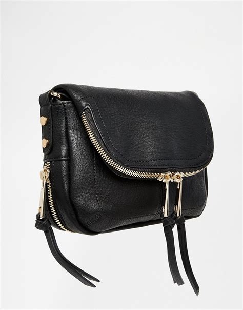 black crossbody bag with gold detail